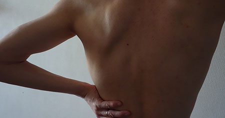 Imagen representativa de los síntomas de la Fibromialgia y su impacto en la vida diaria