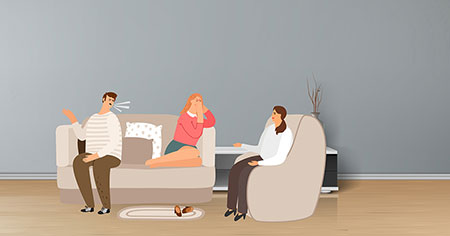 Imagen de una pareja trabajando con un terapeuta